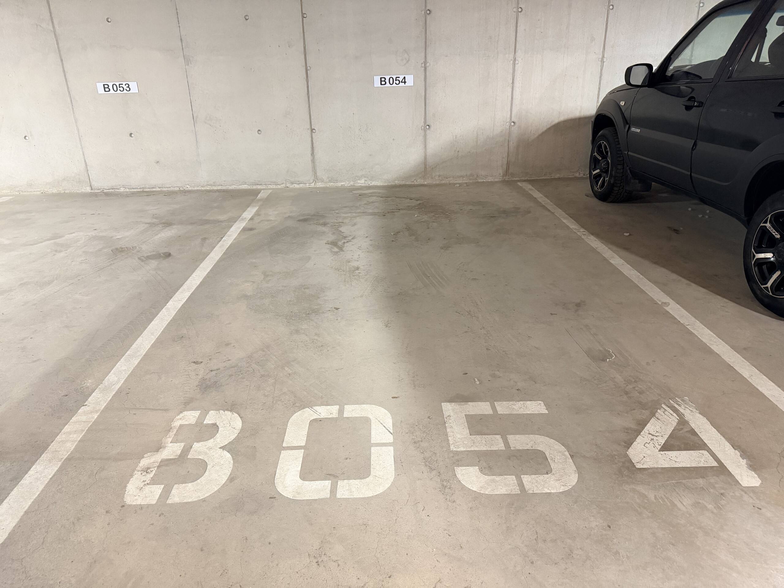 The garage entrance ramp at the back of the building.